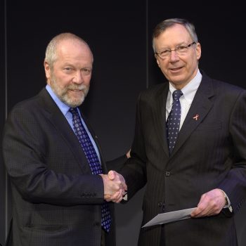 Gary Slaight (left) from the Slaight Family Foundation generously donates $1 million to enable CANFAR to expand its HIV youth awareness activities, presented to Christopher Bunting (right), CANFAR’s President and CEO.